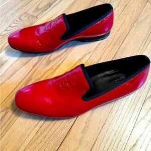 Alexander McQueen
Skull-Embossed Patent Loafer